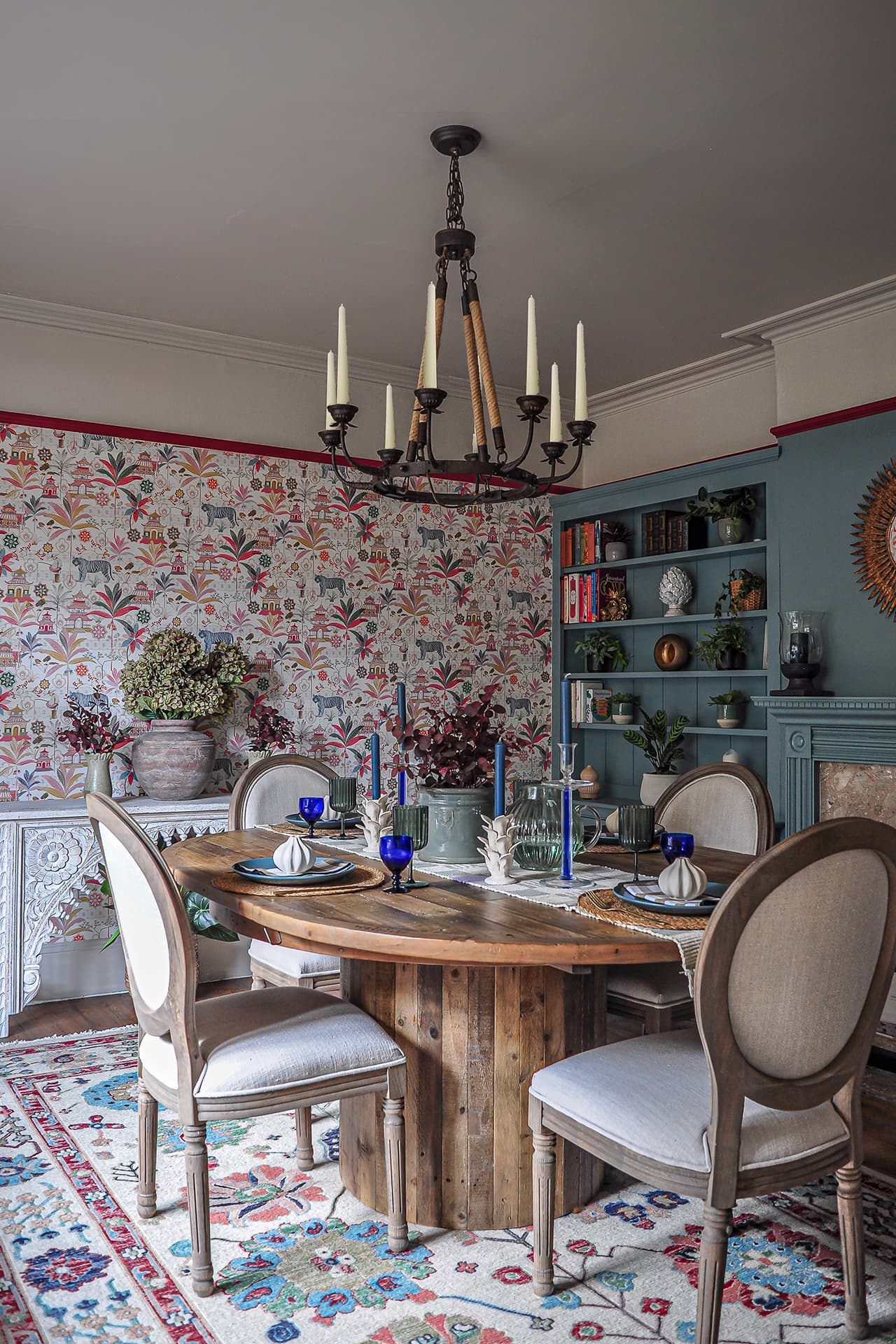 modern colonial style dining room with statement wallpaper