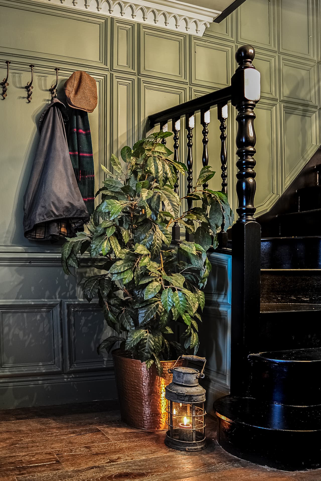 oak panelled hallway with matching panelled radiator cover