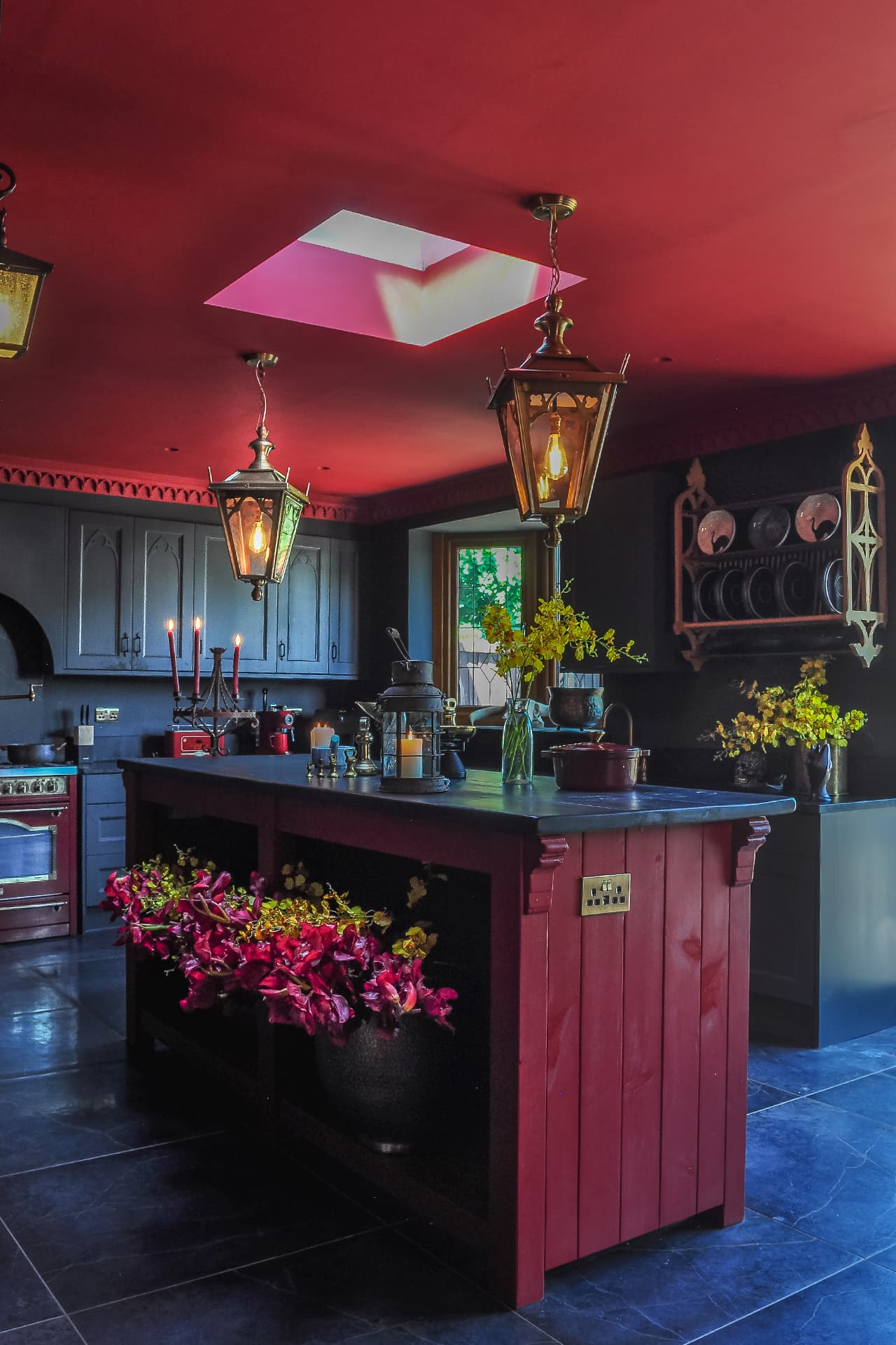 black gothid kitchen with red ceiling