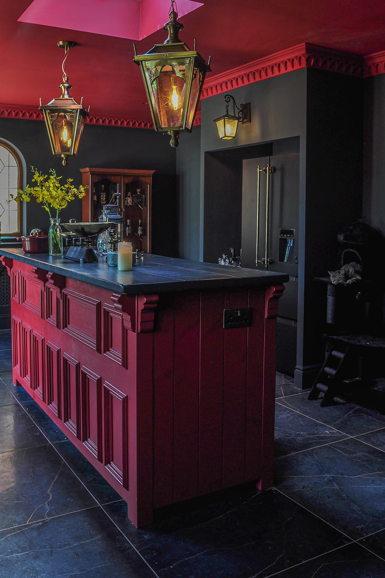 black gothic kitchen with red ceiling